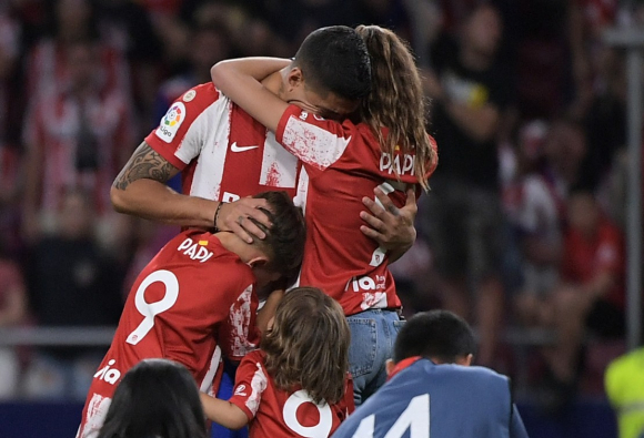 Antoine Griezmann tar med glede farvel til Luis Suárez